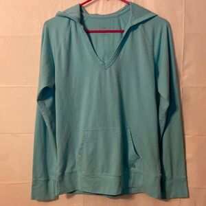North face light blue Tshirt hoodie size large. Has some tiny spots see pictures